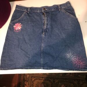 Vintage Higher State Jean skirt with flower embellishments. Pockets , zipper.